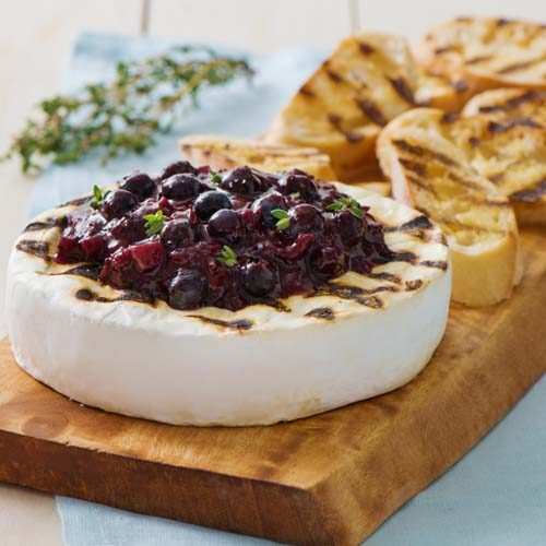 Grilled Brie Wheel With Field Berry And Fig Chutney