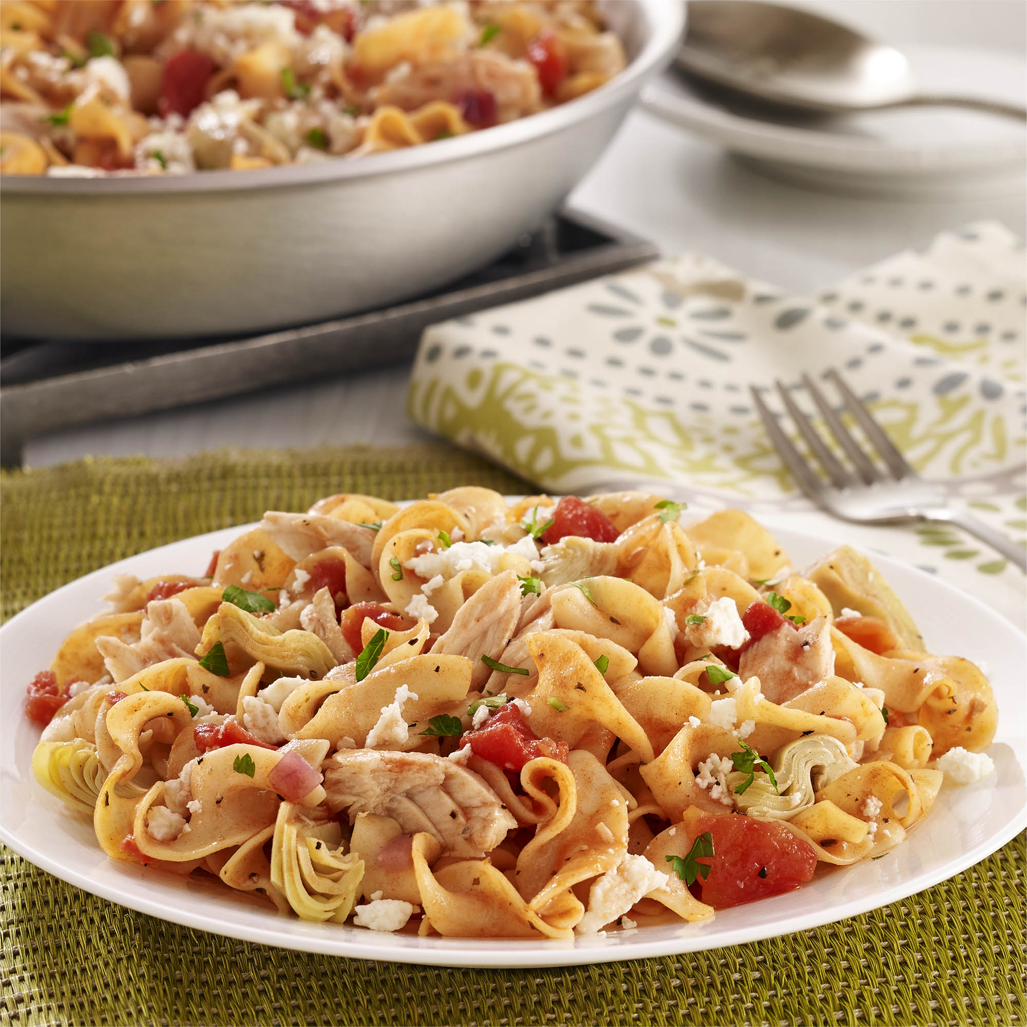 Mediterranean Tuna Noodle Skillet Tuna and noodles gets a modern twist thanks to fresh, new flavors from artichokes, tomato and feta cheese. Ready in just 30 minutes!