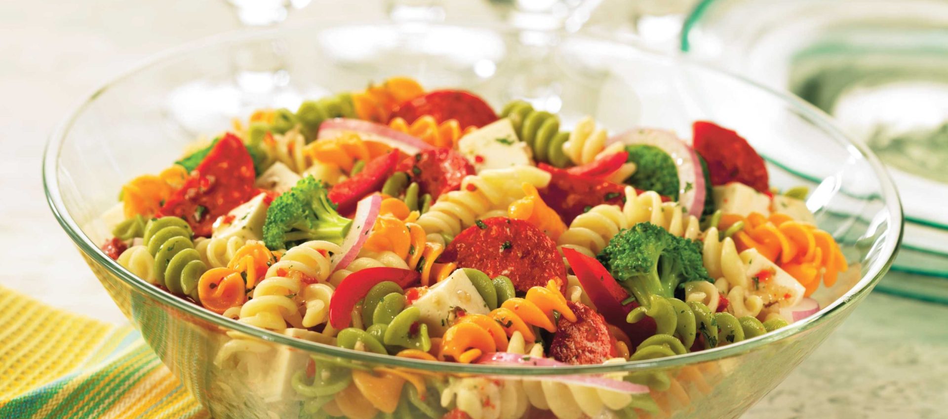 Pepperoni, mozzarella, and vegetables combine for an Italian-inspired pasta salad that’s easy and quick to pull together.