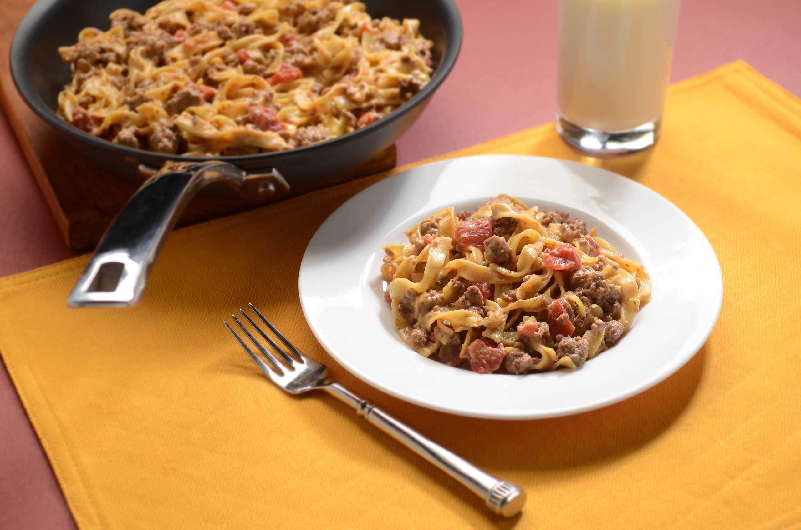 Cheeseburger-flavored dish with egg noodles, ground beef, and tomatoes, topped with cheese