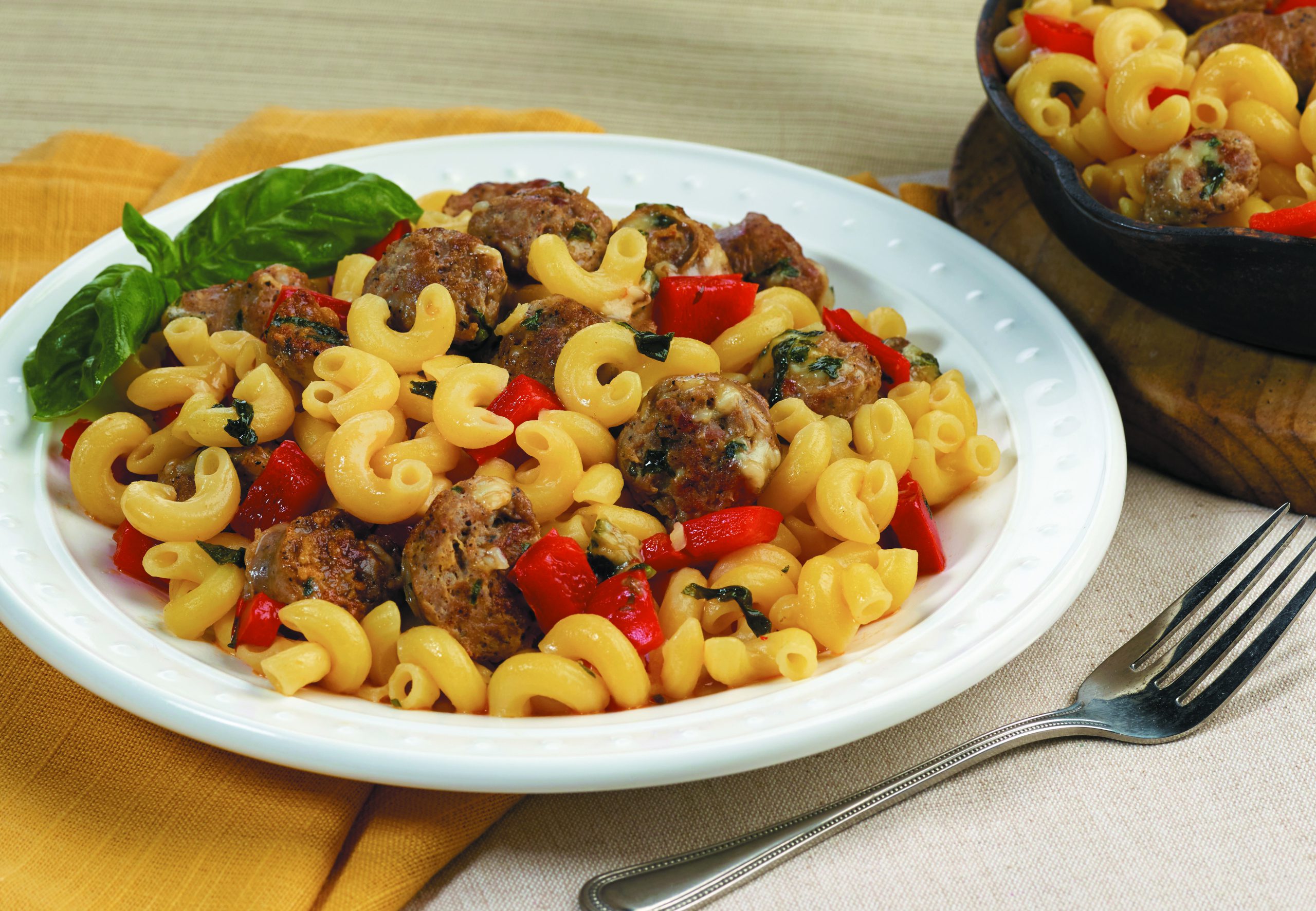 Elbows with Italian sausage, sweet red peppers, and basil
