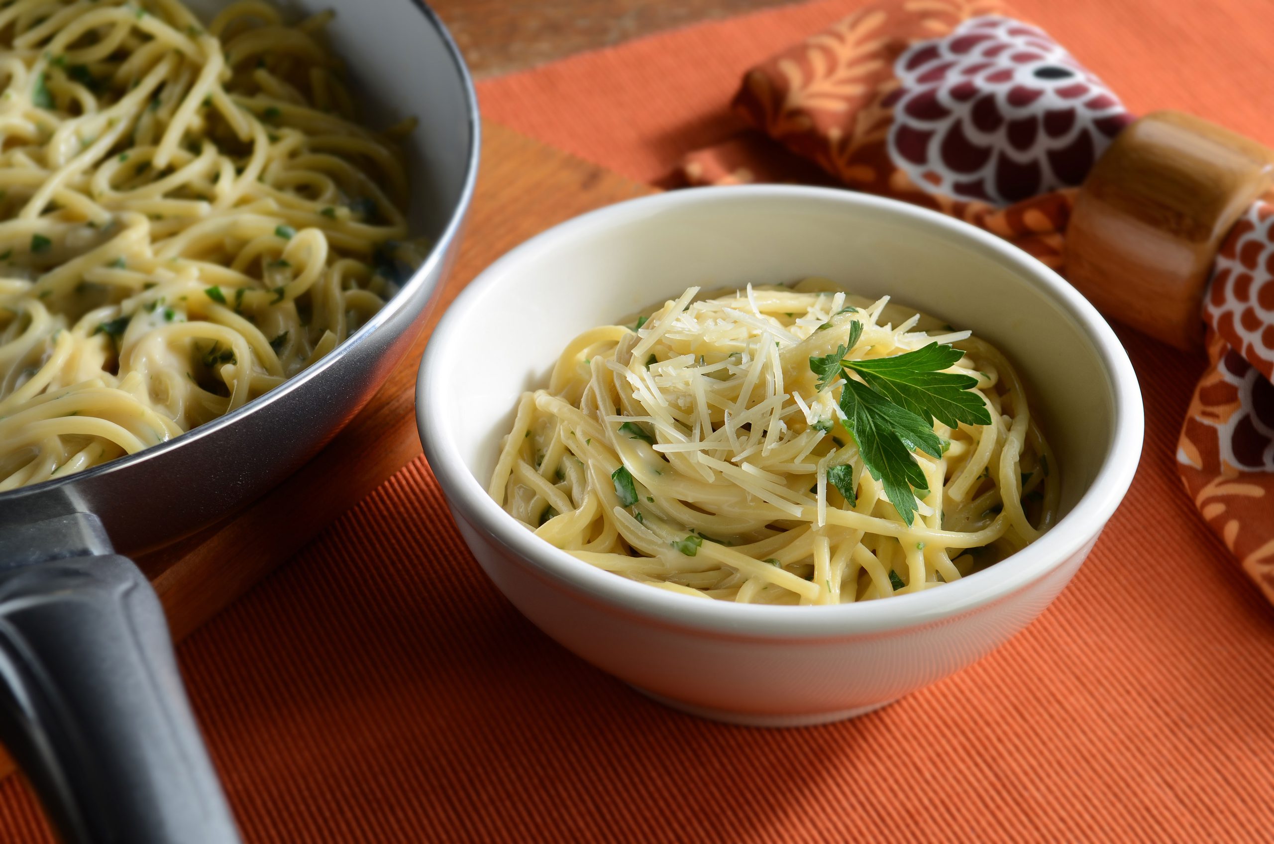 Herb linguine with Alfredo sauce, basil, and fresh parsley, topped with Parmesan