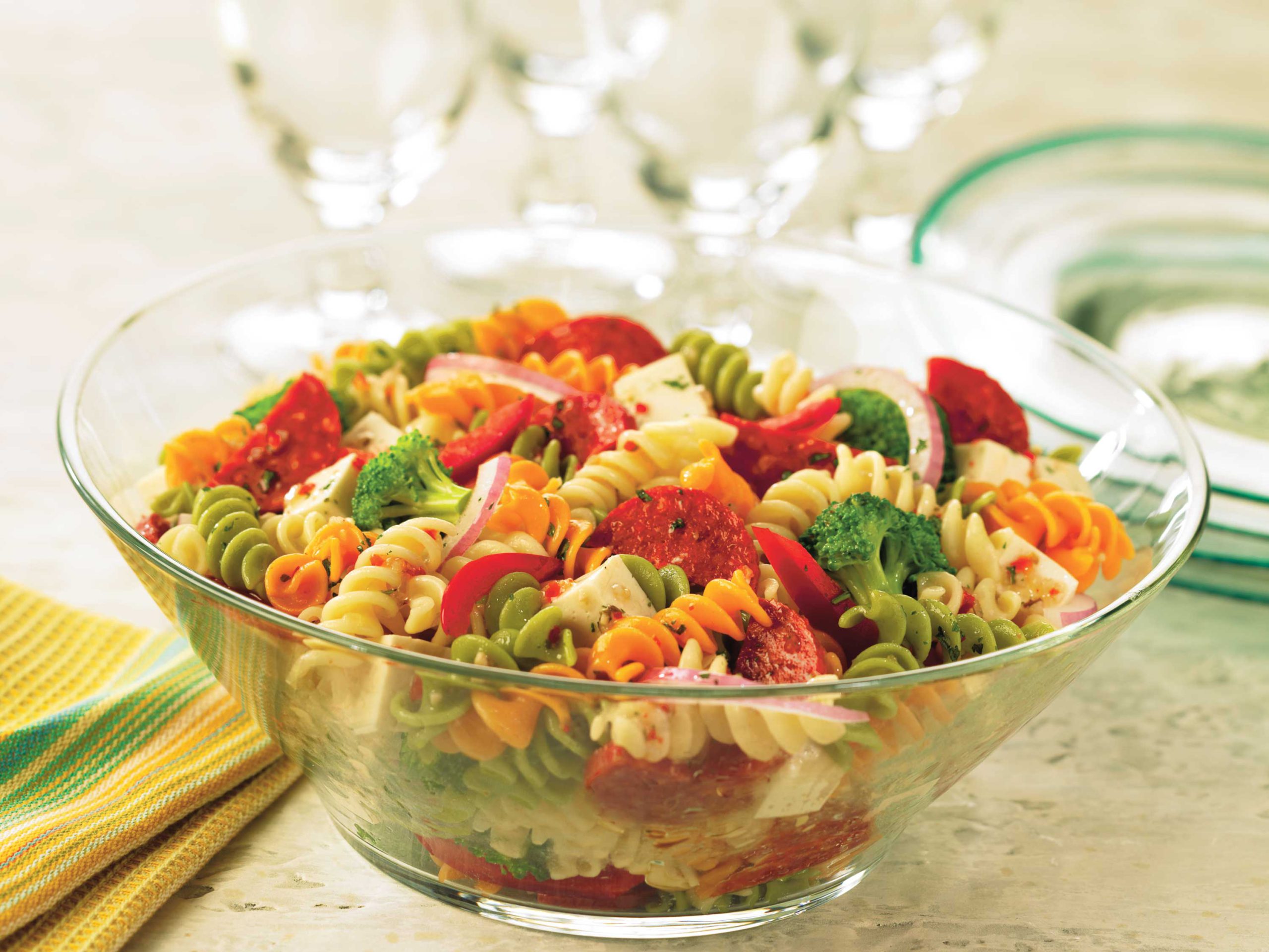 Pepperoni, mozzarella, and vegetables combine for an Italian-inspired pasta salad that’s easy and quick to pull together.